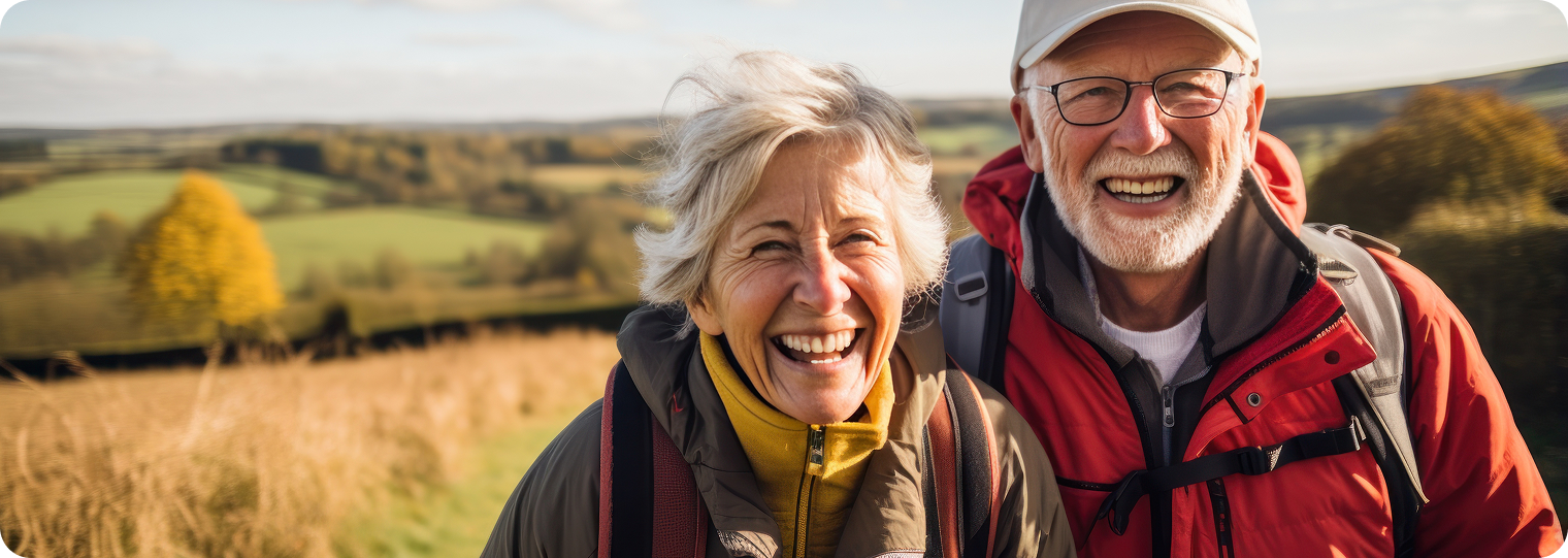 Happy elderly couple enjoying the outdoors — chronic pain treatment at dpac